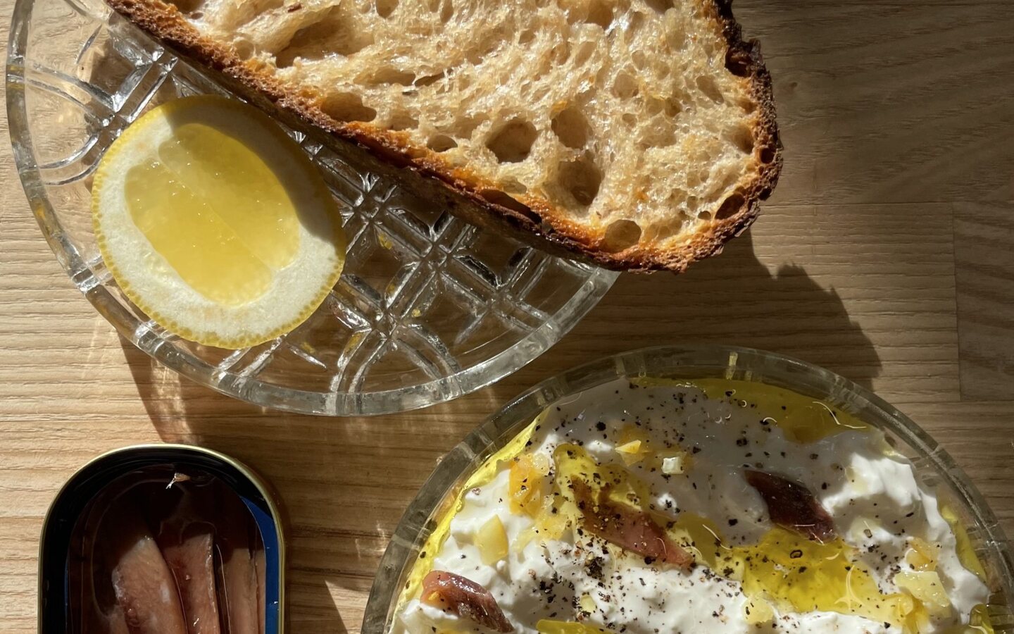 Bread, anchovies and whipped cheese served at Barbarea