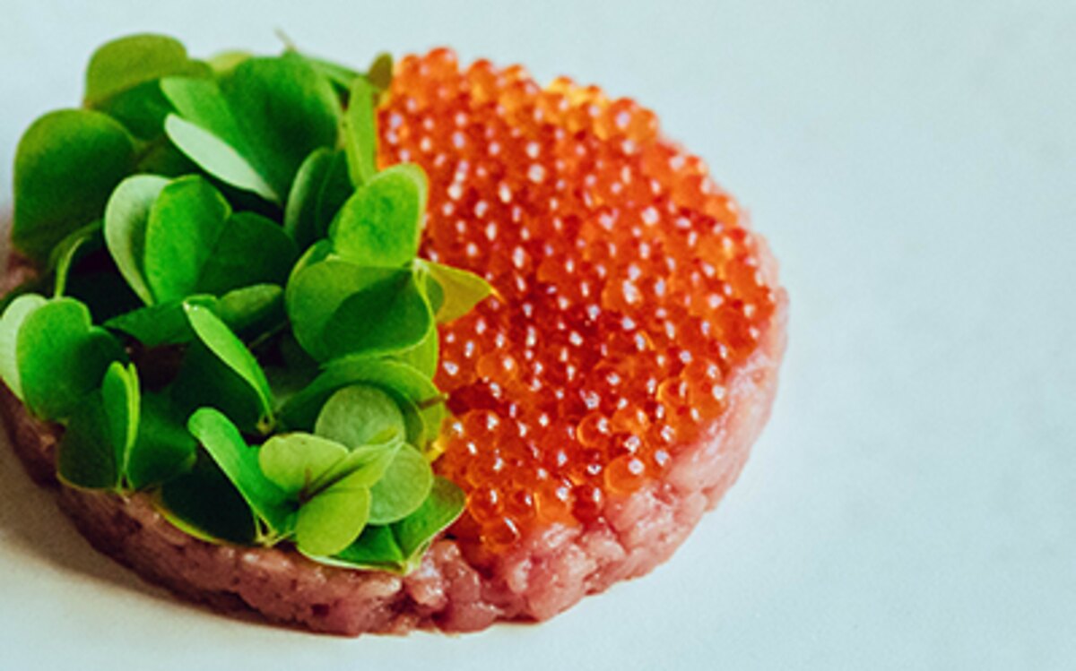 Seasonal tartare topped with trout roe and greens at Rado